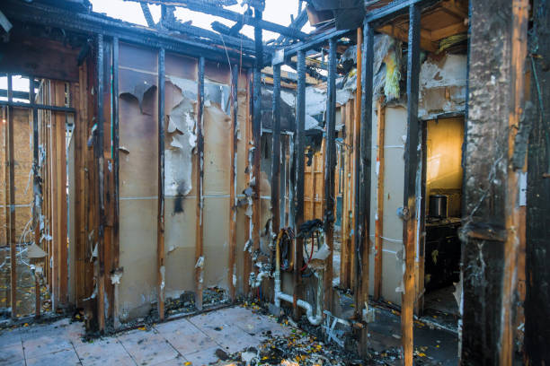 Professional Fire Damage Removal technician working in Fulton, NY